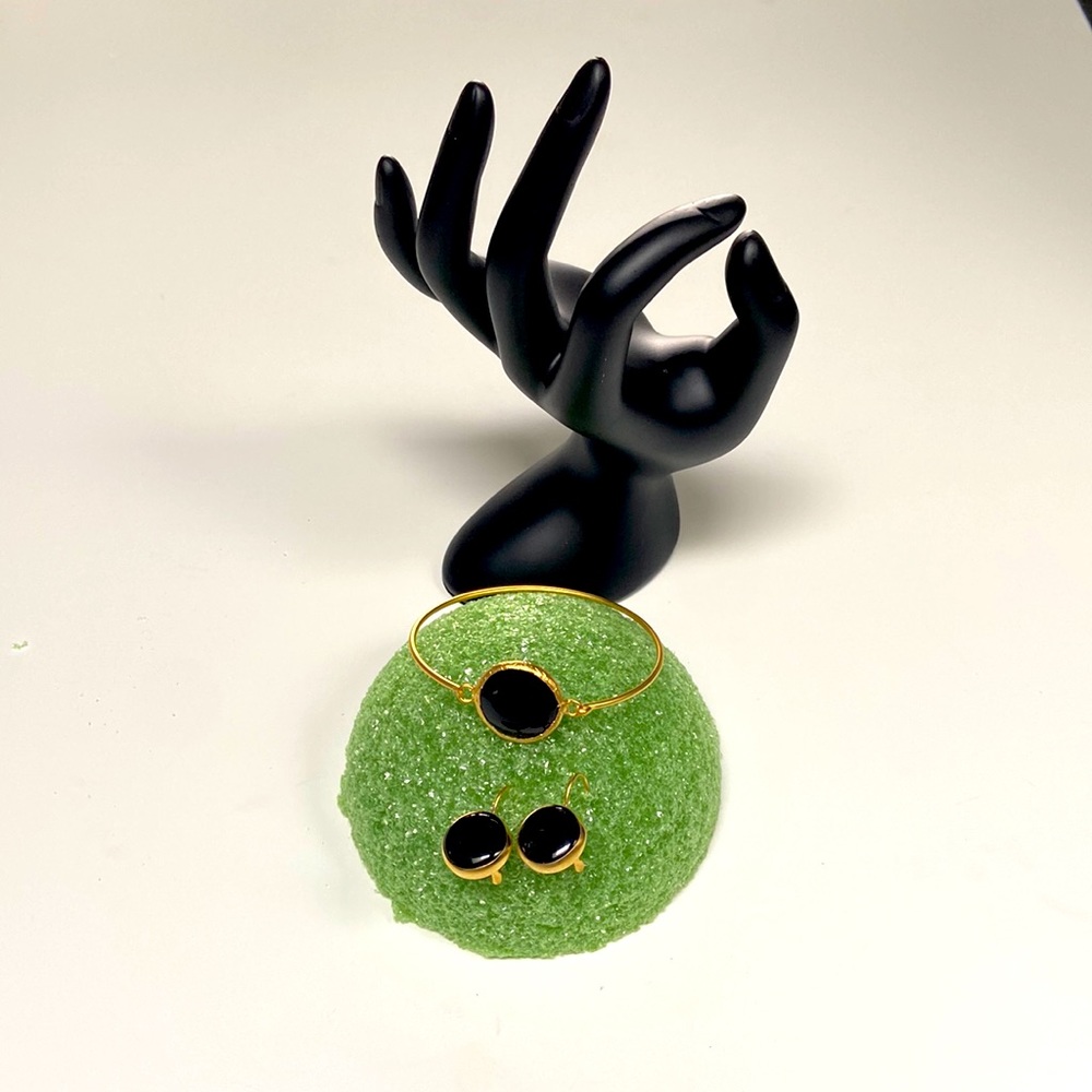 NWT Black stone matching bracelet and earrings.